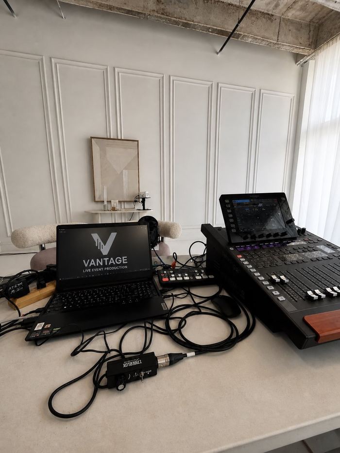 Laptop, switcher and cabling for a hybrid meeting